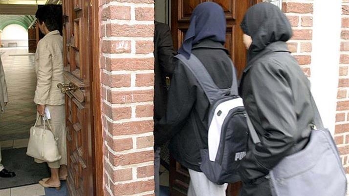 Quebec moves to ban religious symbols including headscarves worn by school staff, students